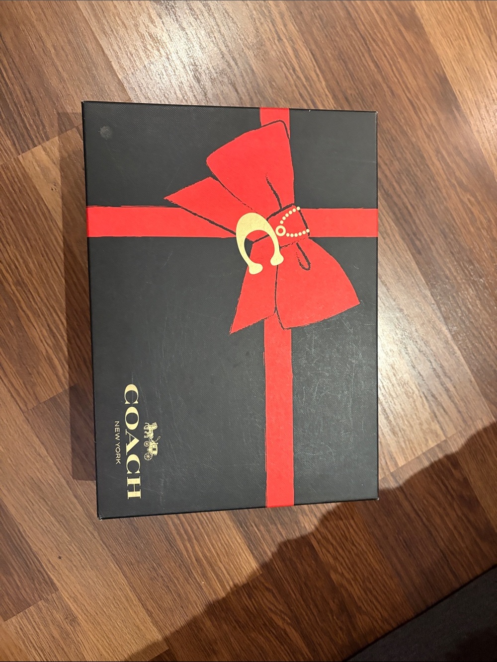 Coach Black Box with Red Bow and Gold Logo